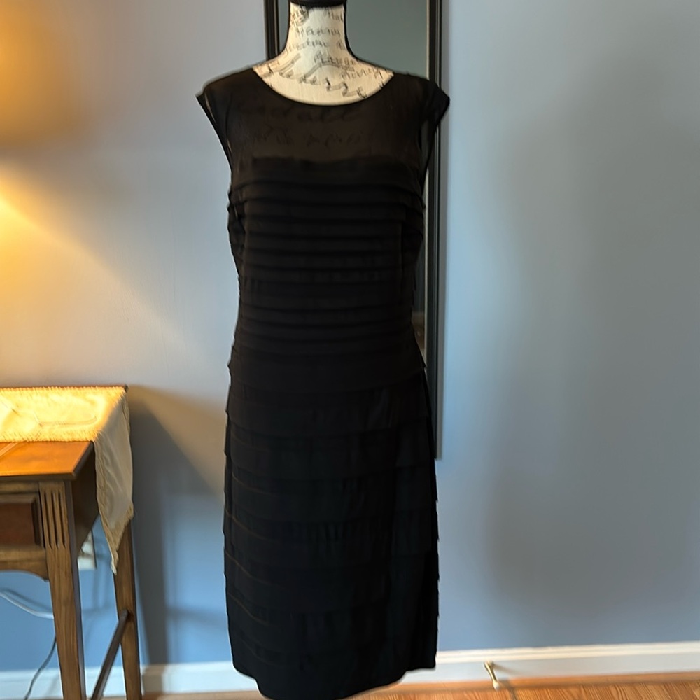 LBD . Perfect for an evening out. Dark Black with back zipper and button.EUC